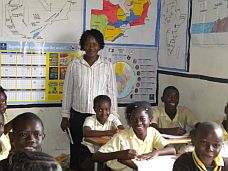 a Birdland school teacher with her students