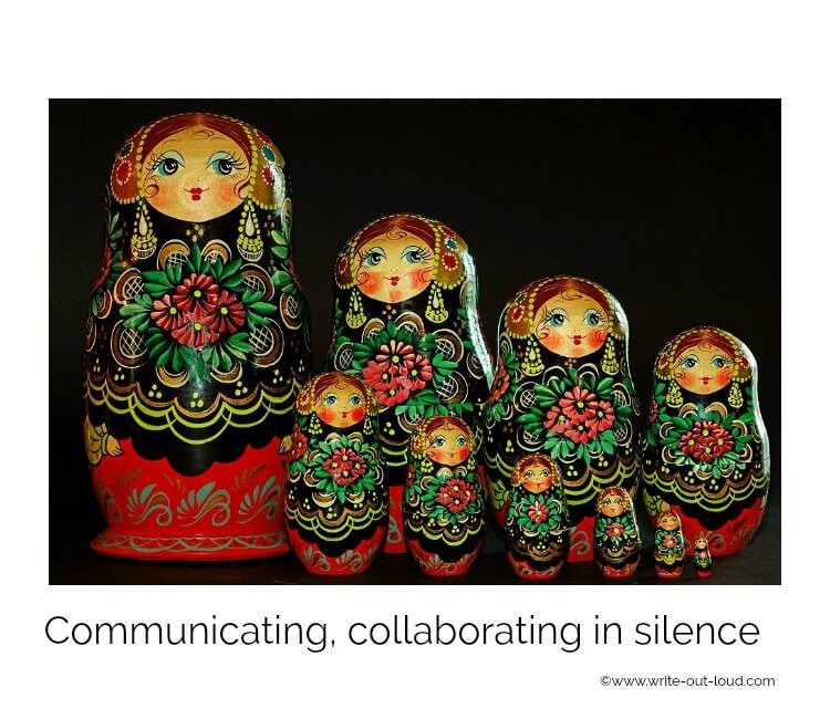 A line of Russian dolls with text: communicating and collaborating in silence. A line of Russian dolls with text: communicating and collaborating in silence.