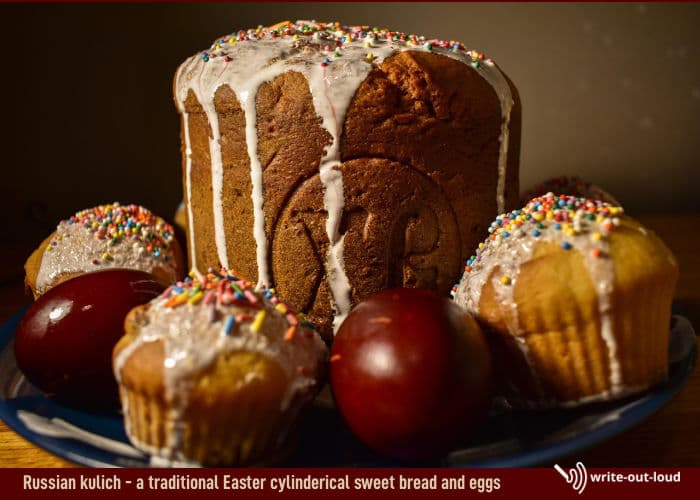 Traditional Russian Orthodox Easter bread - Kulich, with decorated eggs and buns