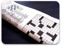 Folded newspaper showing crossword Folded newspaper showing crossword