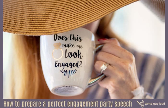 Image: Young woman, wearing an engagement ring holding a mug with text: Does this ring make me look engaged?
