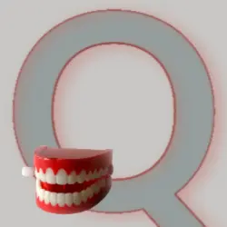 An uppercase letter Q - with a set of wind-up teeth! An uppercase letter Q - with a set of wind-up teeth!