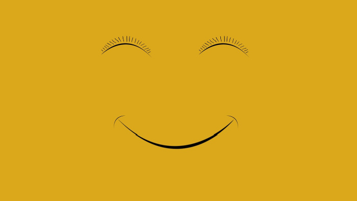 Black line drawing of 2 smiling eyes and a mouth on yellow background Black line drawing of 2 smiling eyes and a mouth on yellow background